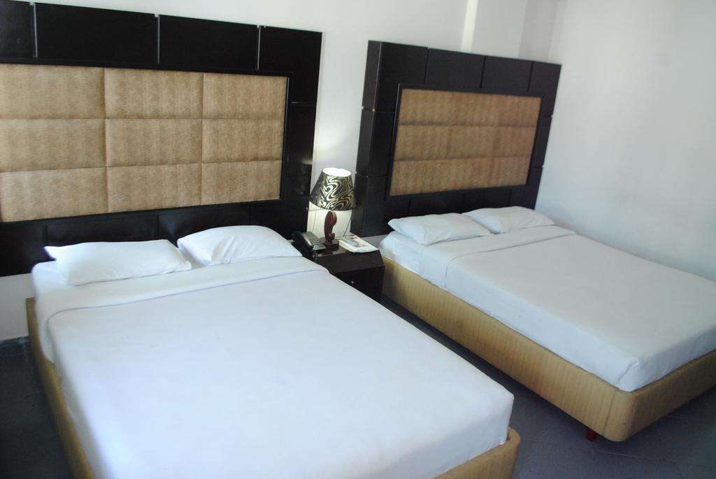 Hotel Mishuk Cox's Bazar Quarto foto